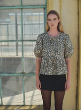 Load image into Gallery viewer, Animal Print Front Bow Tie Peplum Blouse