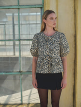 Load image into Gallery viewer, Animal Print Front Bow Tie Peplum Blouse